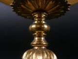 a close up of a lamp that is on a table