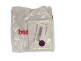 a white bag with a red and white label on it