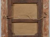 an old wooden picture frame with a rope hanging from it ' s side