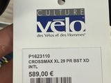 a person holding a tag that says yelo