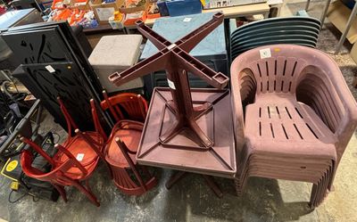 many different chairs and tables in a room