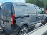 a van that is parked on the side of the road