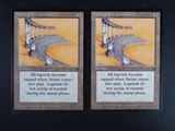 two cards that have a picture of a bridge on them