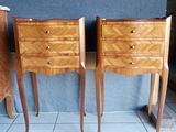 two nightstands that are next to each other on a tiled floor