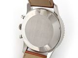 an image of a close up of a wrist watch on a white surface