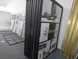 an image of a room with a lot of items in it