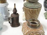 many different vases that are sitting on a table
