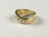 an image of a gold ring with diamonds on it