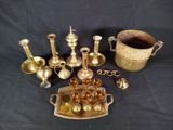 a lot of brass items on the table
