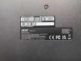 a close up of the back of a laptop with a sticker on it