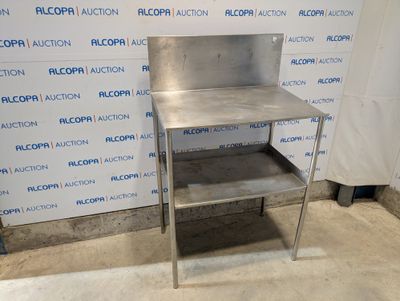 an image of a stainless steel work table in a room