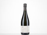 a bottle of wine that is sitting on a table
