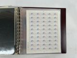 a binder with a picture of a baseball game on it