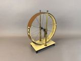 a model of a bicycle wheel on a stand