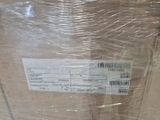 a box with a price label on it wrapped in plastic