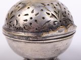 an antique silver box with a lid and a decorative design
