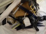a pile of assorted items sitting on a bed
