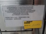 a label on the side of a machine that says robot creme