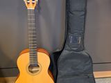 a guitar and a guitar case next to each other