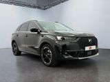 the new dsx suv is parked in a showroom