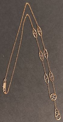 Chaîne en or jaune 18K avec des maillons en filigrane