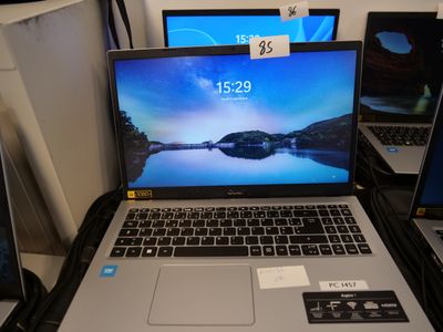 two laptops that are sitting on a table