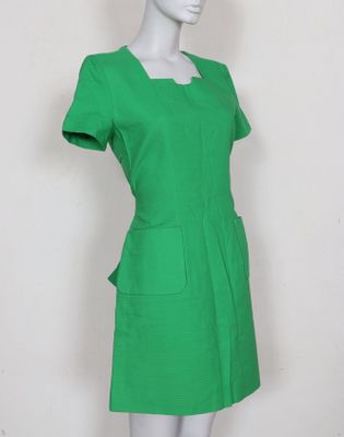a green dress on a mannequin mannequin mannequin mannequin mannequin mann