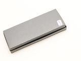 a gray box with a black lid sitting on a white surface