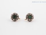 an image of a pair of emerald and diamond earrings