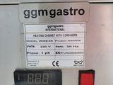 a close up of a machine with a clock on it