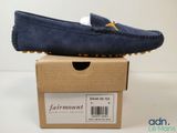 men ' s loafer in blue sued with a white sole
