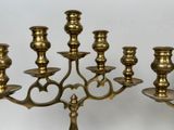 five candles that are sitting on a table