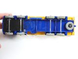 a small toy truck that is being held up by a person