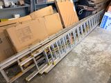 many boxes stacked on top of each other in a warehouse
