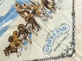 a white table cloth with a picture of a group of dogs on it