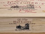 a wooden box that has some writing on it