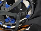 a helmet that is sitting on top of a bag
