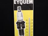 une image représentant un panneau jaune et noir sur lequel figure un thermomètre