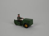 a green toy truck with a man on it