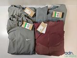 three pairs of men ' s nike running pants and a pair of men ' s nike running pants