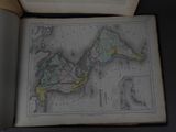a map of the world in a book on a table