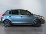 a picture of a silver car parked in a garage