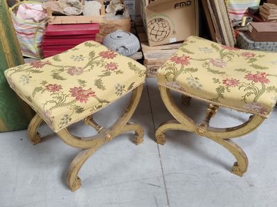 two stools that are sitting next to each other