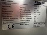 a picture of a sign on the wall of a machine shop