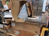 a large pile of boxes and boxes on a pallet
