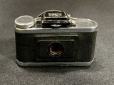 a small camera that is sitting on a table