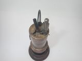 a small metal object that is sitting on a table