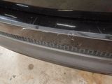 a close up of the front bumper of a car