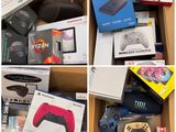 many different types of video game controllers in a box