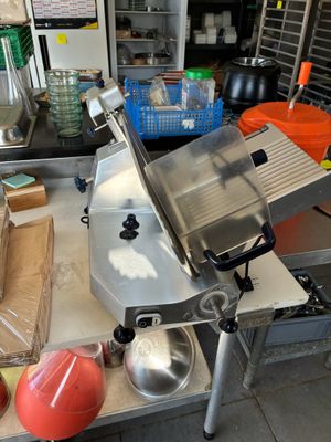 a machine that is sitting on a table in a kitchen